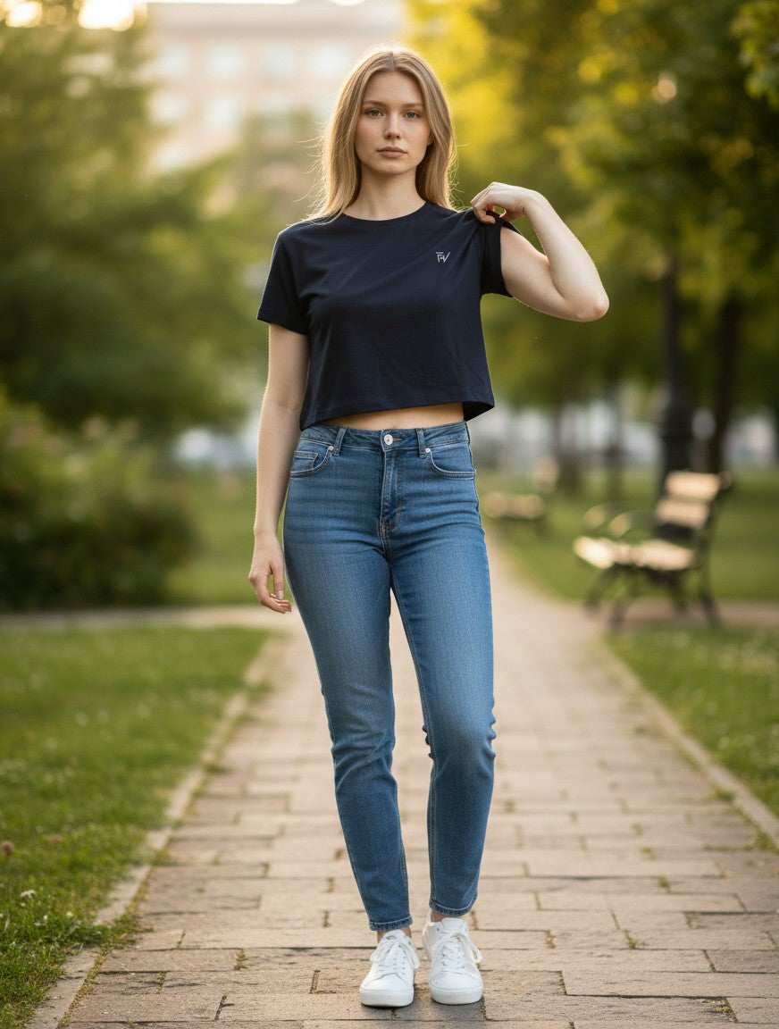 Fourthwave black cropped baby tee made from 95% cotton and 5% spandex blend with bio-wash finish and embroidered logo.