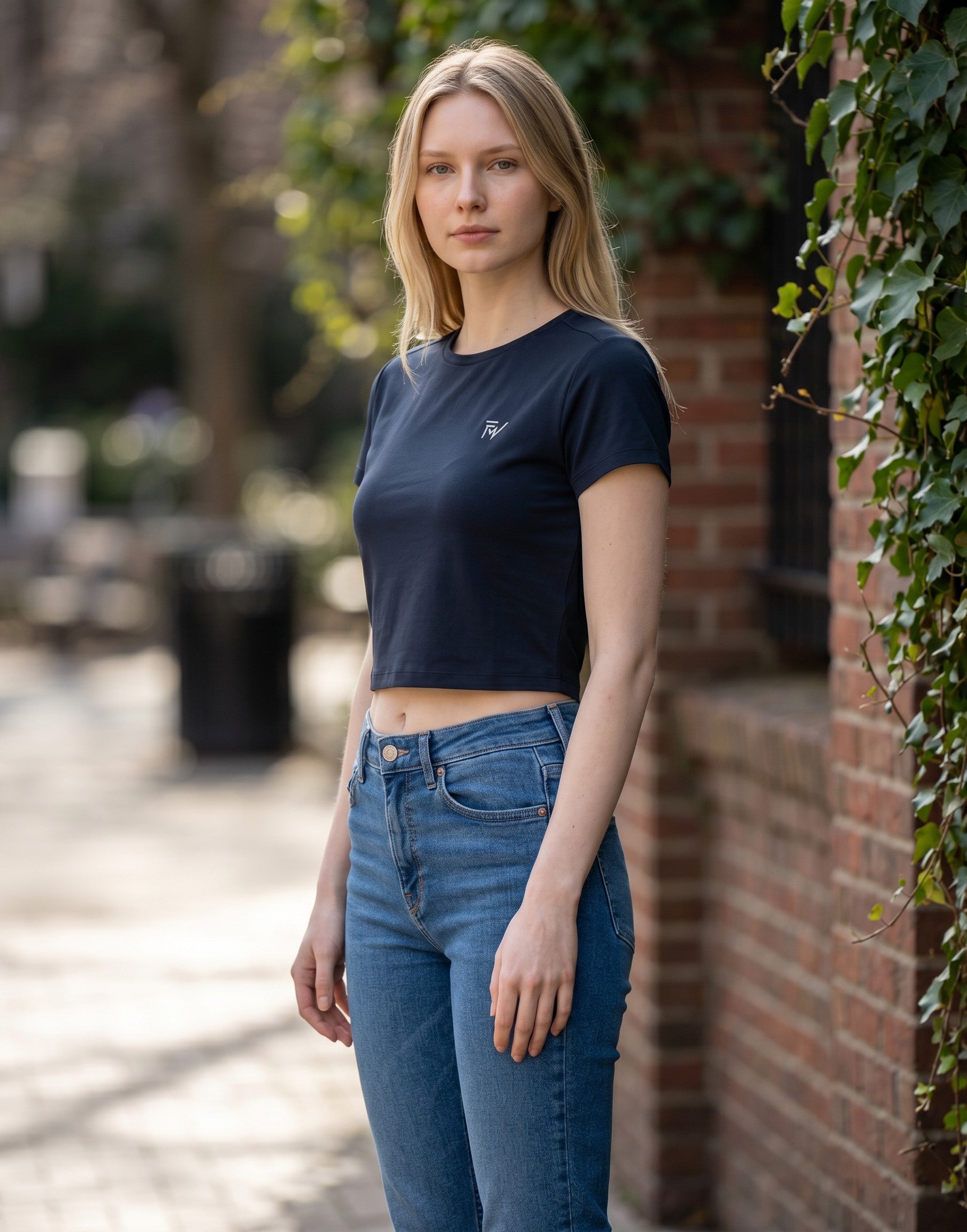 Fourthwave dark navy blue cropped baby tee made from a soft 240 GSM cotton-spandex blend with a bio-wash finish.