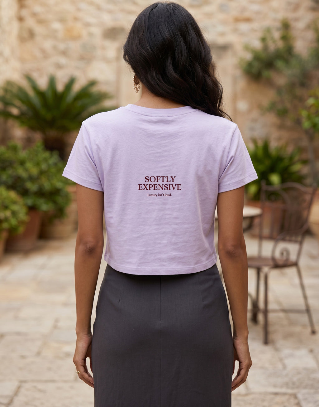 Fourthwave pastel pink cropped t-shirt with crew neck and short sleeves, featuring text graphic.