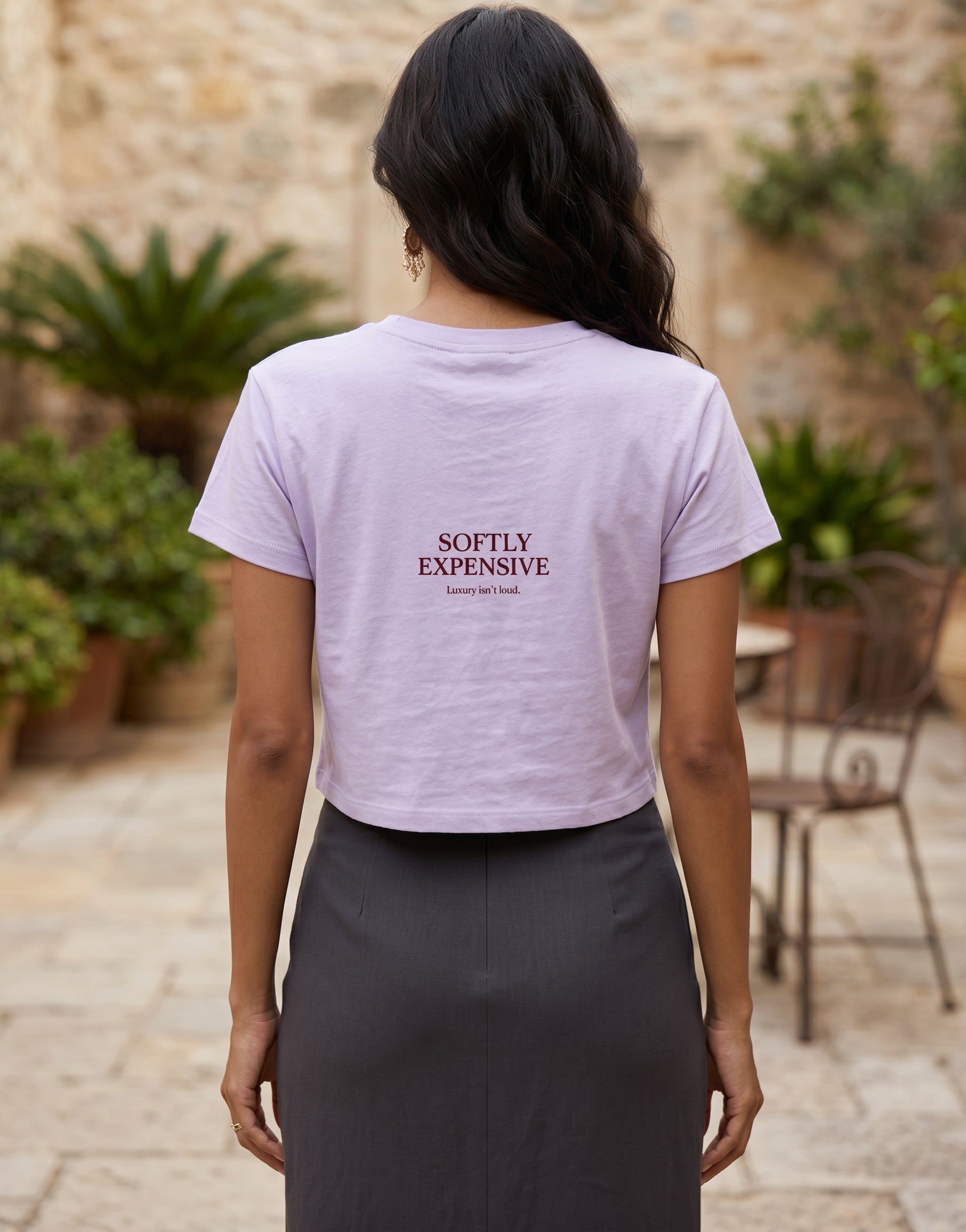 Fourthwave pastel pink cropped t-shirt with crew neck and short sleeves, featuring text graphic.