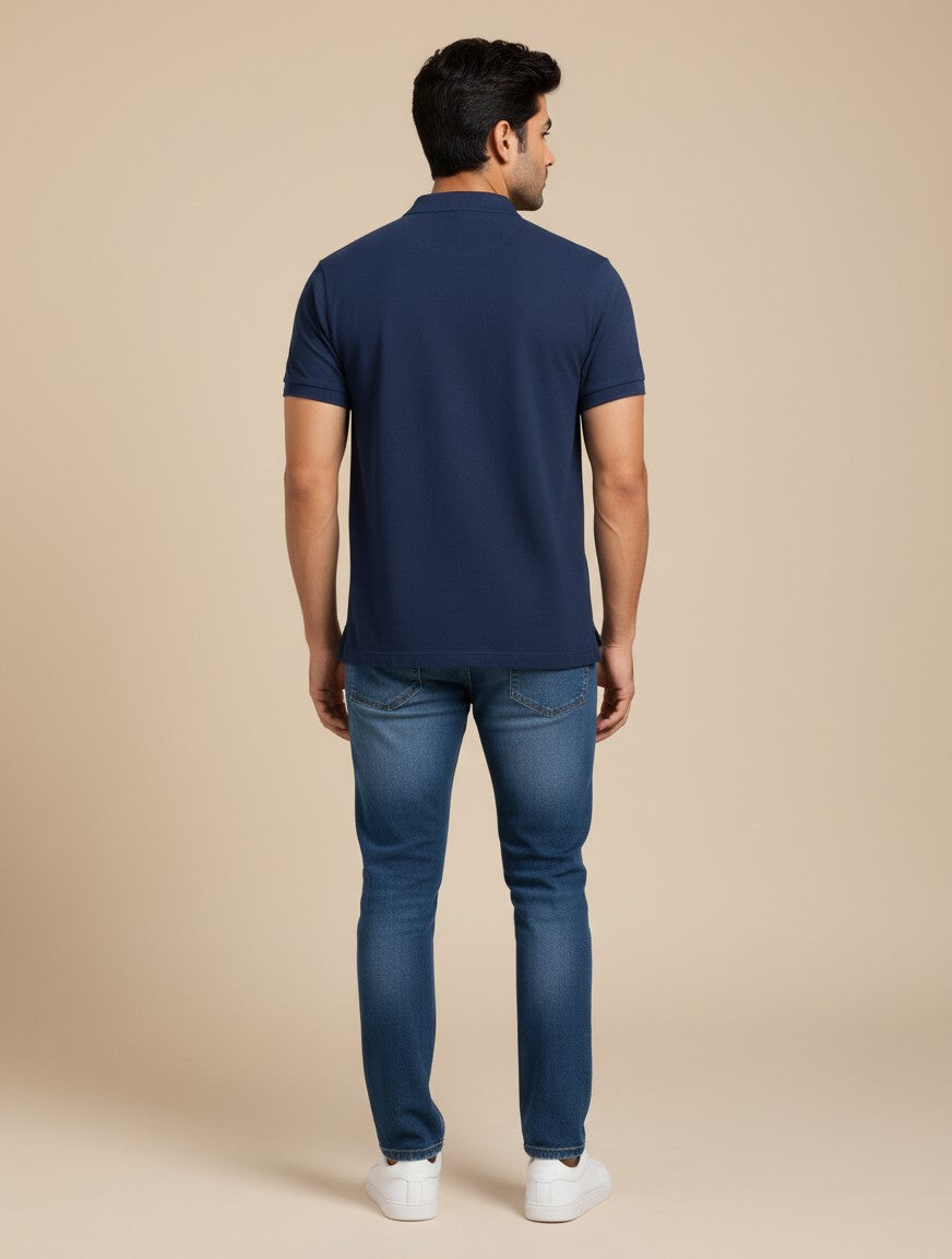 Fourthwave Men's navy blue 100% cotton polo shirt with textured finish and structured collar.