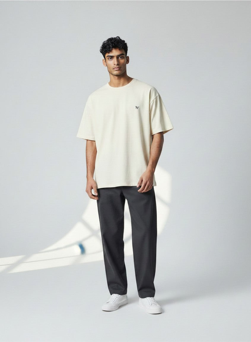 Fourthwave Unisex oversized classic t-shirt in cream, made from 100% cotton with a small embroidered logo on the chest.