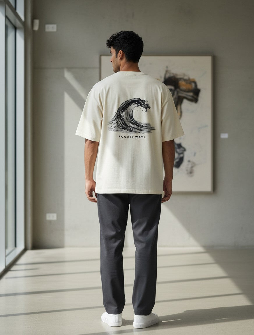 Fourthwave cream 100% cotton oversized t-shirt with a black wave graphic and brand name.