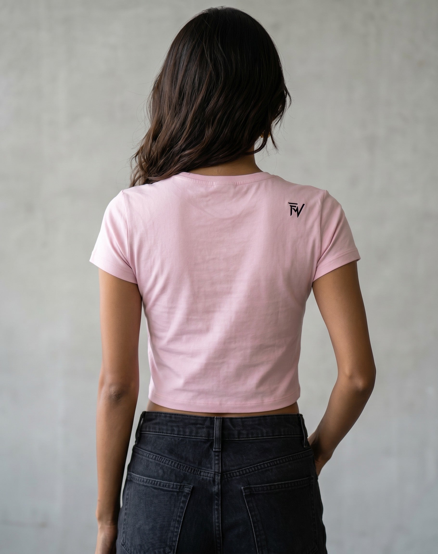 Fourthwave pastel pink cropped t-shirt with crew neck and embroidered logo on chest, worn by a model.