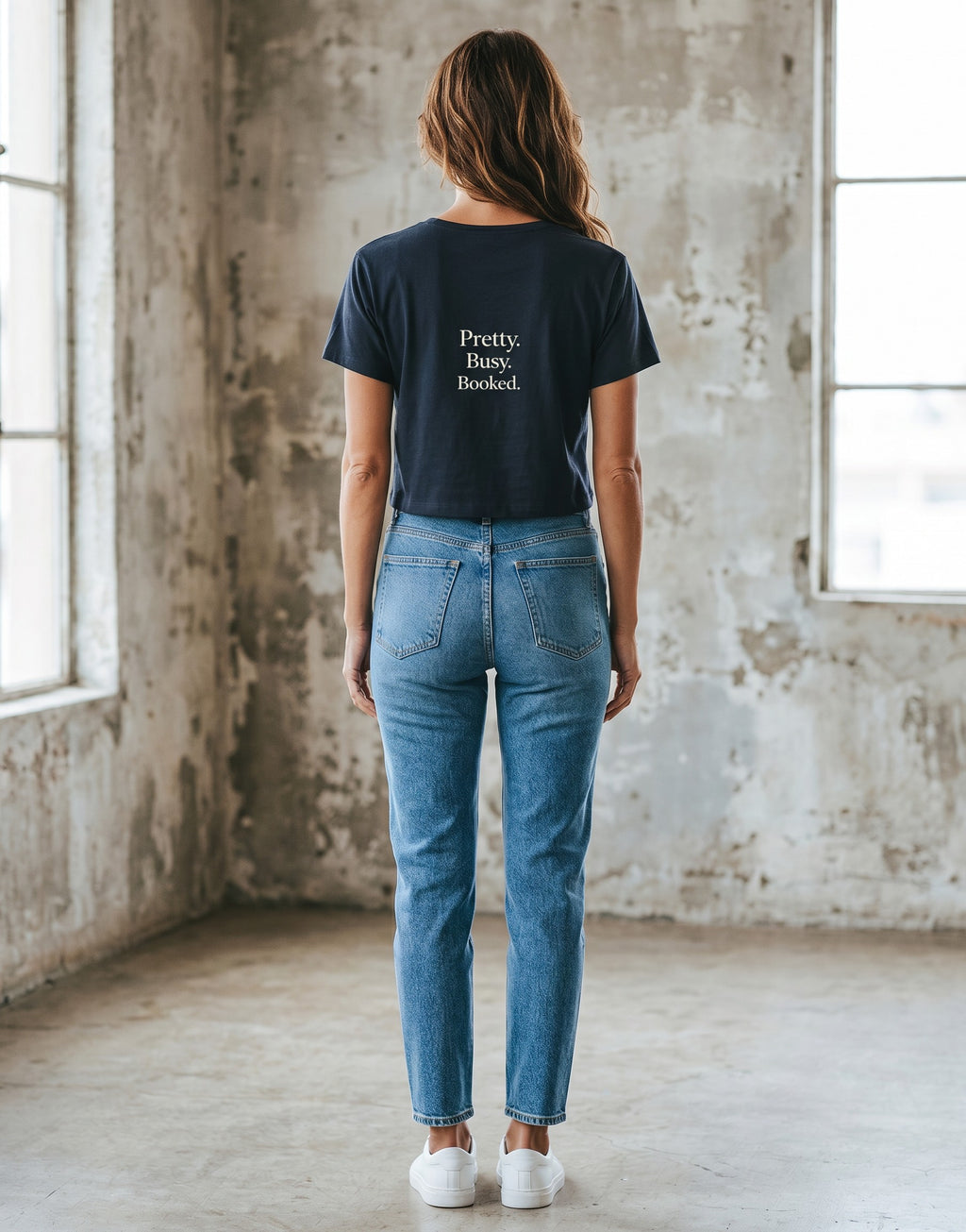 Fourthwave black cotton blend cropped t-shirt with "Pretty. Busy. Booked." slogan on the back.
