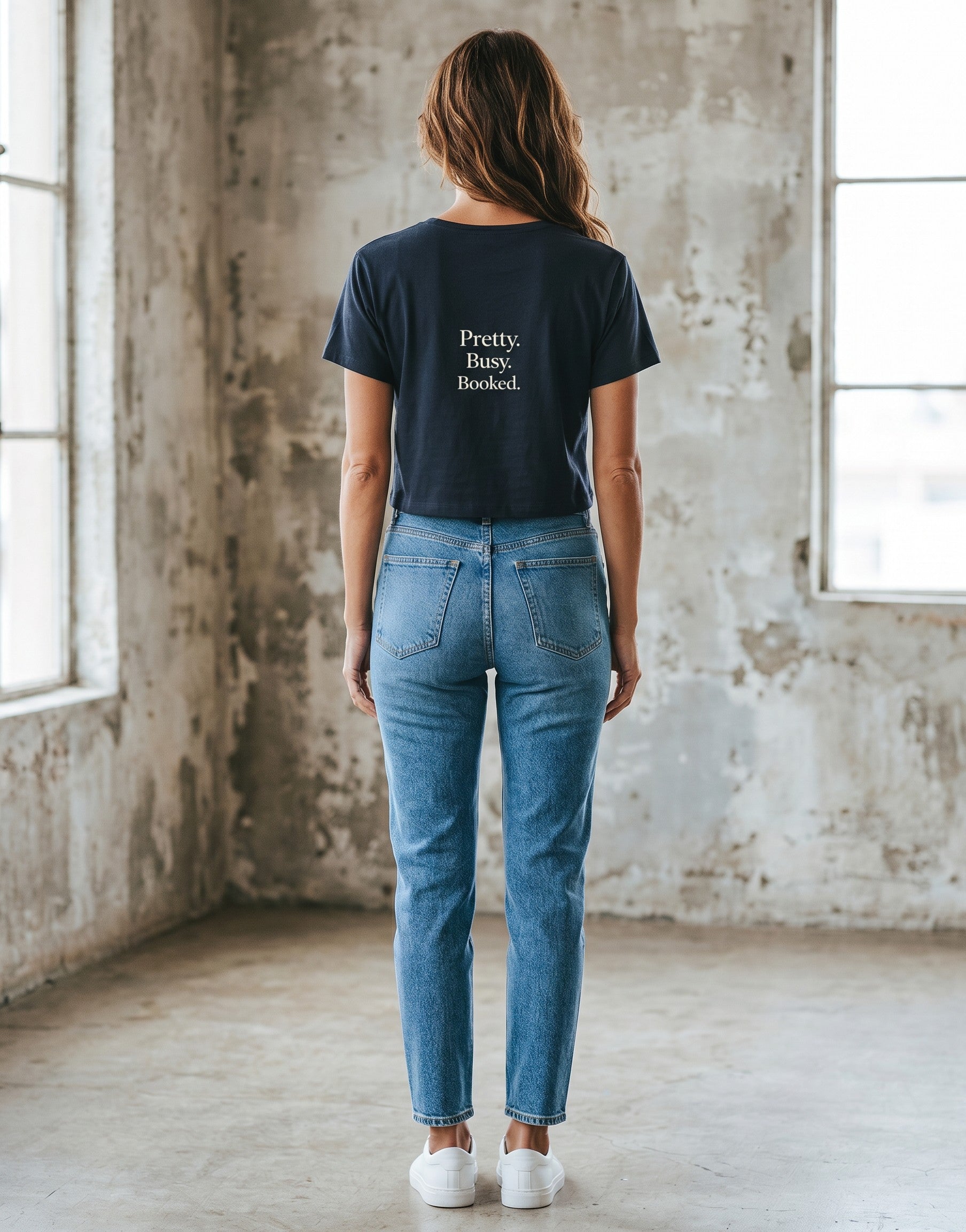 Fourthwave black cotton blend cropped t-shirt with "Pretty. Busy. Booked." slogan on the back.