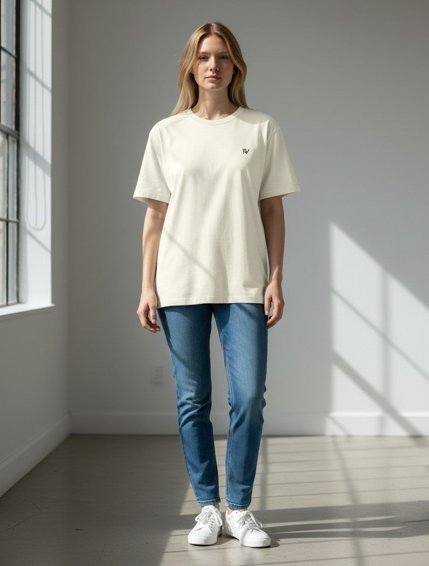 Fourthwave Unisex oversized classic t-shirt in cream, made from 100% cotton with a small black logo.