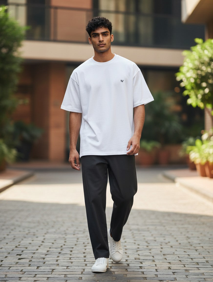 Fourthwave white 100% cotton oversized t-shirt with small black logo on chest. Heavyweight fabric.